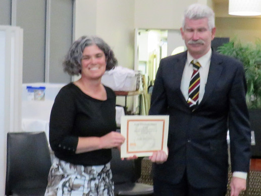 Glen Sullivan receives his award from President Heather Davey